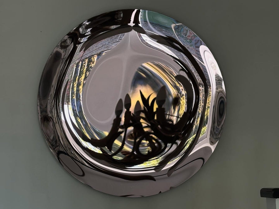 Convex mirror wall decor enhancing light and space in modern home